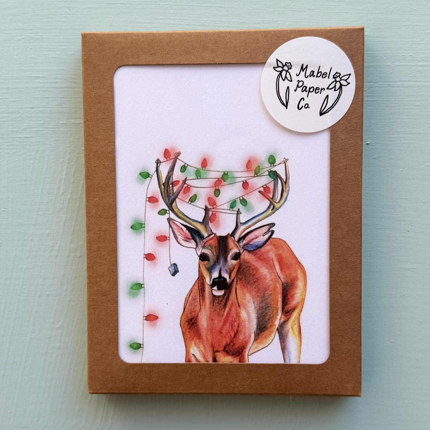 Deer stuck in Christmas Lights Card