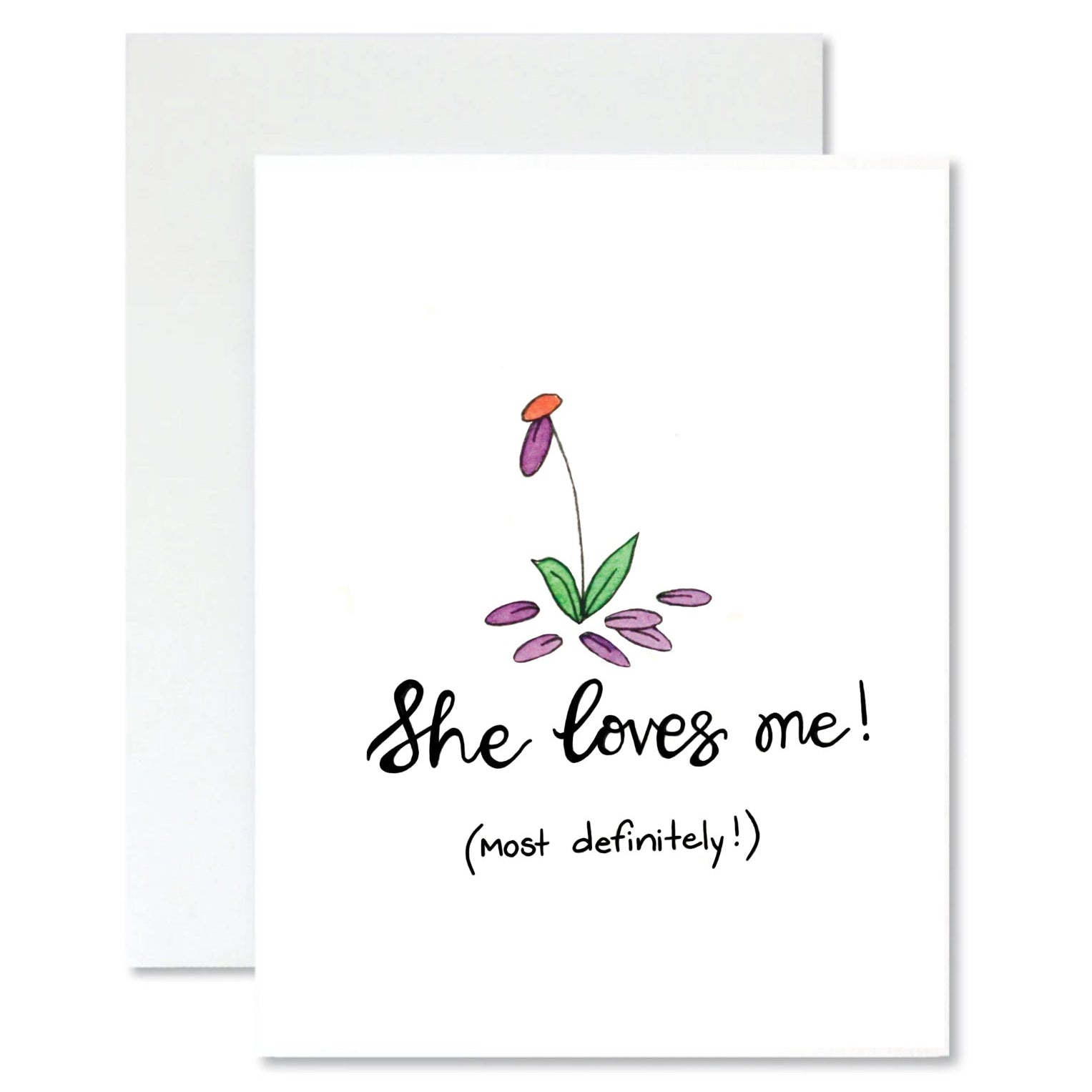 Greeting card with floral design and text 'She loves me! (most definitely!)' on a white background