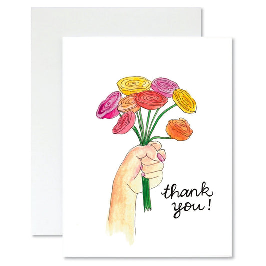 Greeting card with a hand holding flowers and 'thank you!' text on a white background