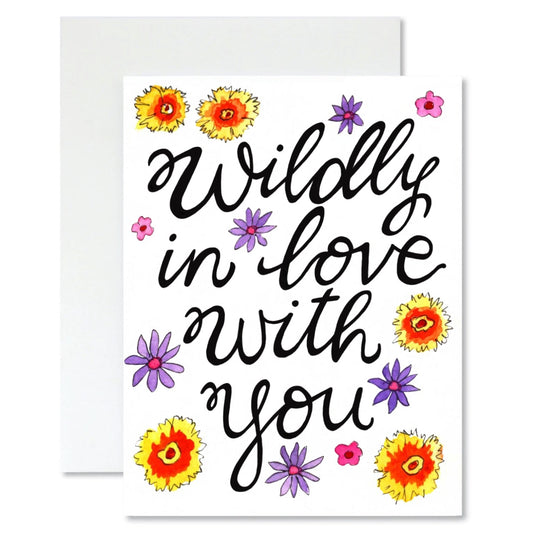 Greeting card with 'Wildly in love with you' text and colorful flowers on a white background